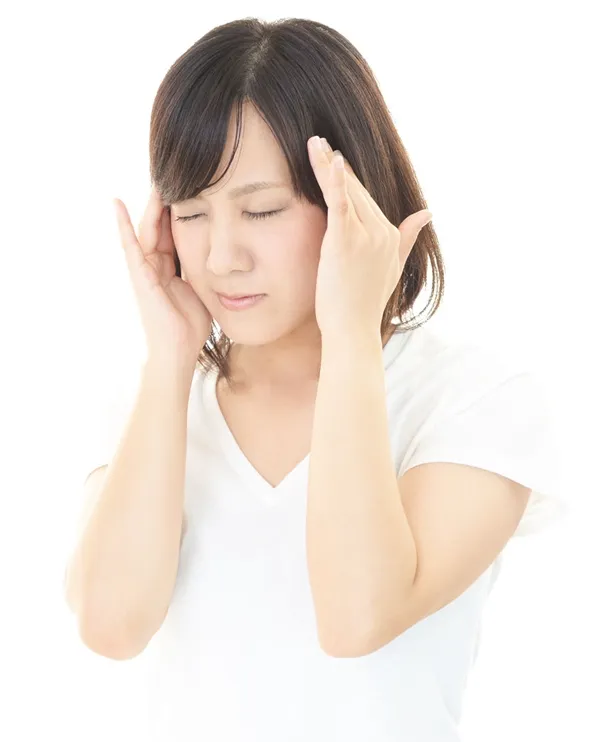 頭痛で困っている女性